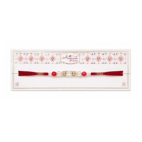 Red Thread Rakhi with Gold Beads and Tassel Ends